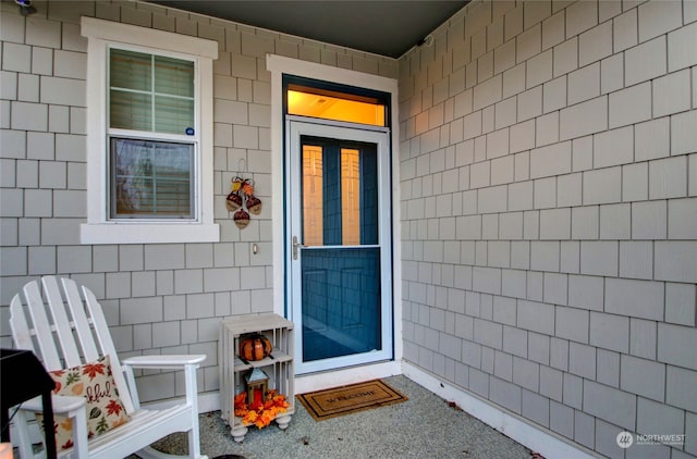 doorway to property with covered porch