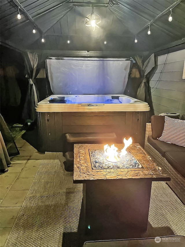 view of patio with a gazebo and a hot tub