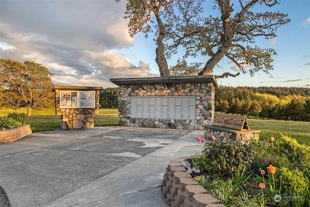 view of patio featuring a mail area