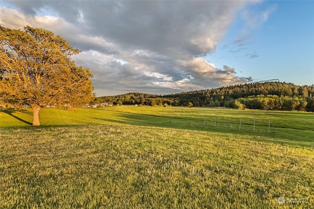 exterior space with a rural view