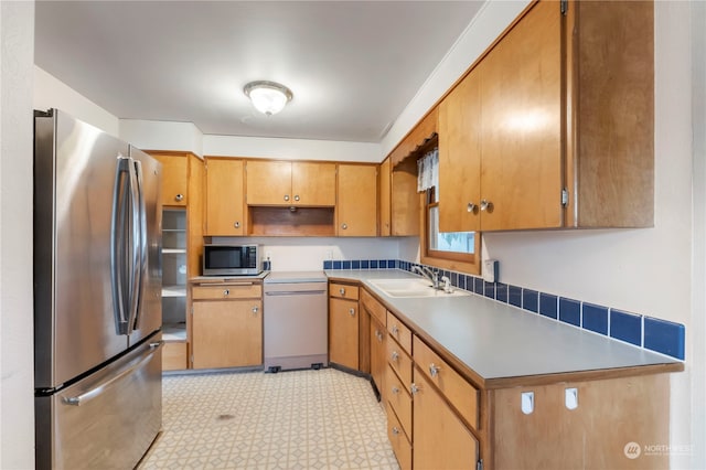 kitchen featuring sink and appliances with stainless steel finishes