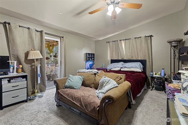 carpeted bedroom with access to exterior, ceiling fan, and lofted ceiling