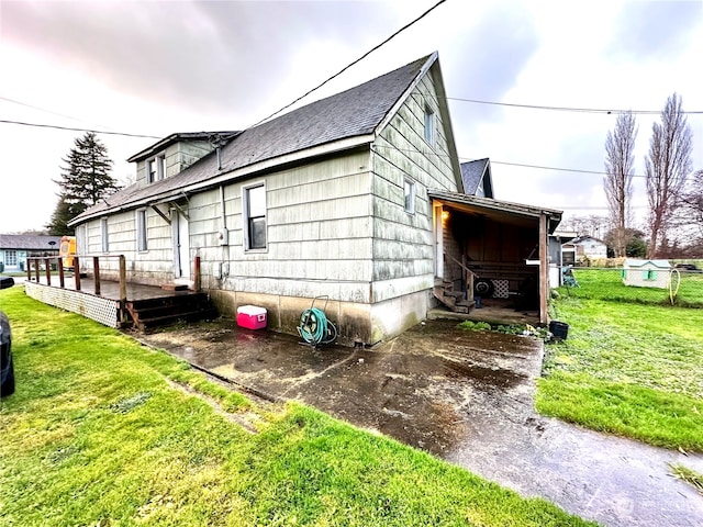 view of property exterior with a yard