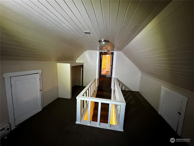 bonus room with wooden ceiling, vaulted ceiling, and a baseboard heating unit