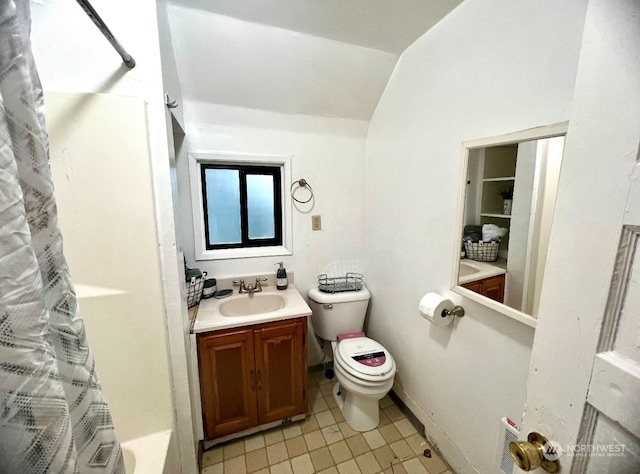 full bathroom featuring toilet, shower / tub combo, vanity, and tile patterned floors