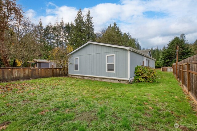 6205 NE Central Valley Rd NE, Bremerton, WA 98311 - view of side of property with a fenced backyard