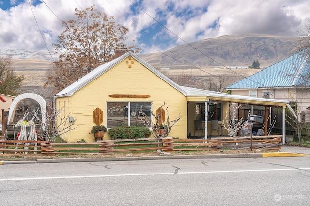 view of front of home with a mountain view