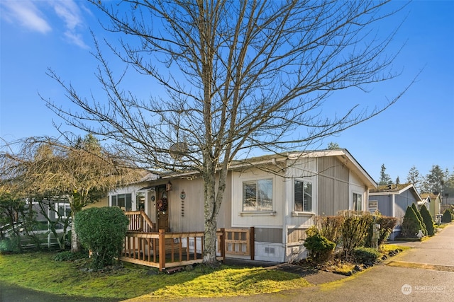 view of front of house featuring a deck