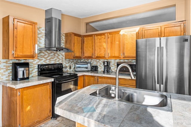 kitchen with luxury refrigerator, sink, black electric range, wall chimney exhaust hood, and tasteful backsplash