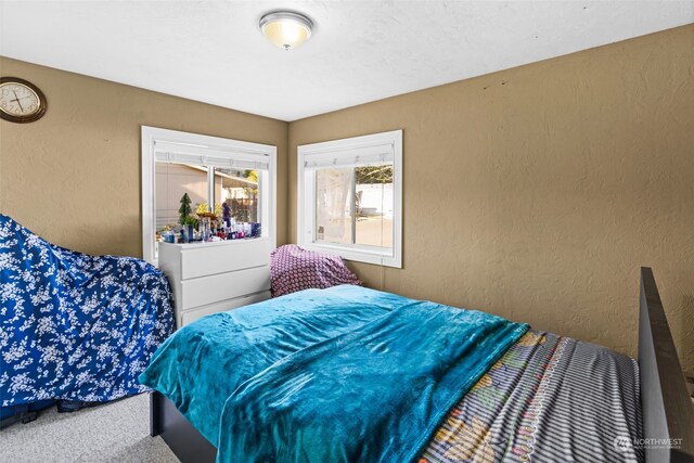 15410 SE 272nd St Unit 16, Kent, WA 98042 - bedroom featuring a textured wall and carpet