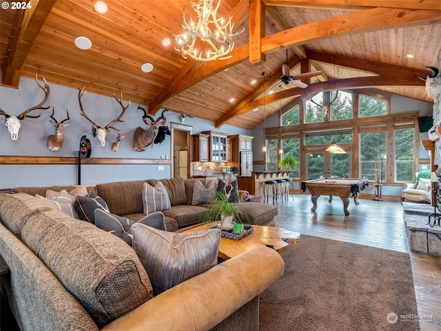 living room with wooden ceiling, beamed ceiling, hardwood / wood-style floors, ceiling fan with notable chandelier, and pool table