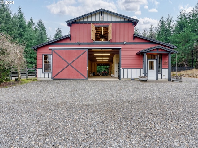 view of front of house with an outbuilding