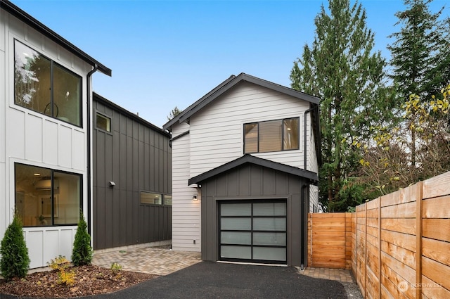 view of front of home with a garage