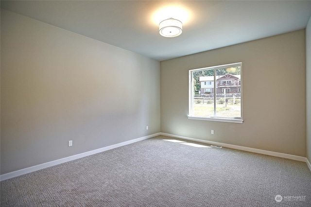 view of carpeted spare room