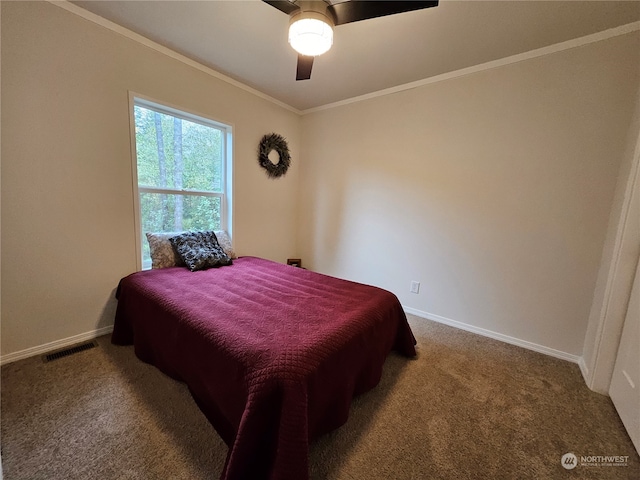 bedroom featuring carpet, ceiling fan, and crown molding