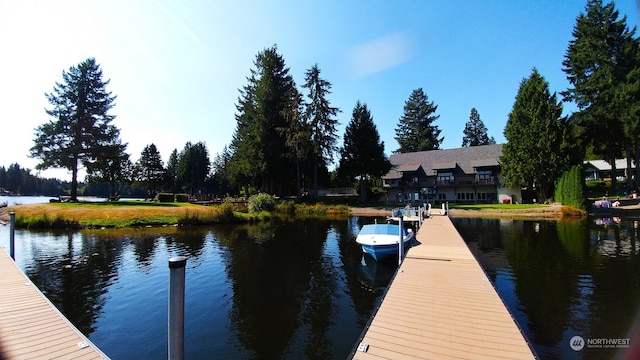 view of dock with a water view