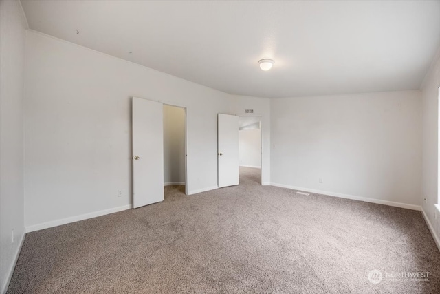 unfurnished bedroom featuring carpet floors