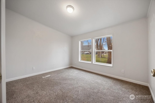 view of carpeted spare room