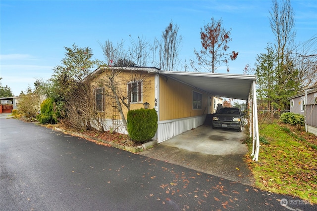 view of front facade featuring a carport