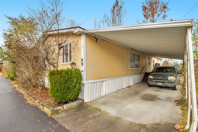 view of property exterior with a carport