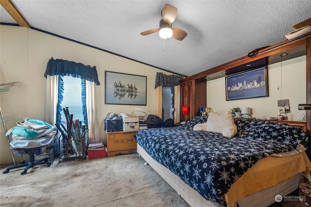 bedroom featuring carpet, a textured ceiling, ceiling fan, and lofted ceiling