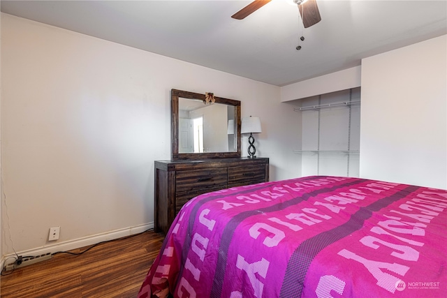 bedroom featuring hardwood / wood-style floors and ceiling fan