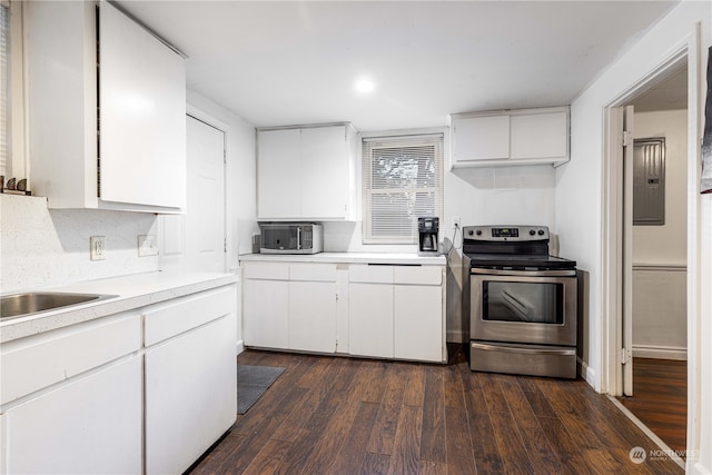 kitchen featuring tasteful backsplash, dark hardwood / wood-style floors, electric panel, stainless steel electric range, and white cabinets