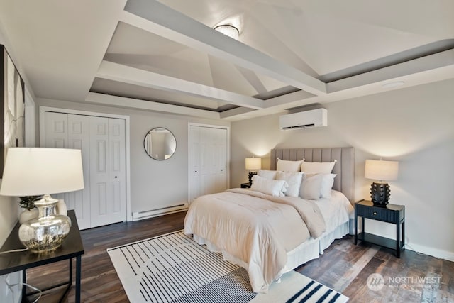 bedroom with baseboard heating, a wall mounted AC, dark wood-type flooring, and lofted ceiling