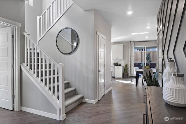 stairway with wood-type flooring