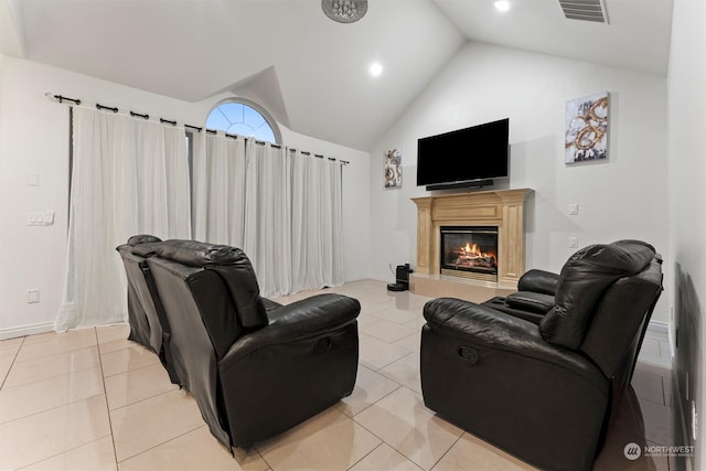 tiled living room featuring vaulted ceiling