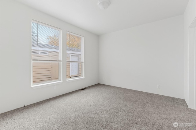 view of carpeted spare room