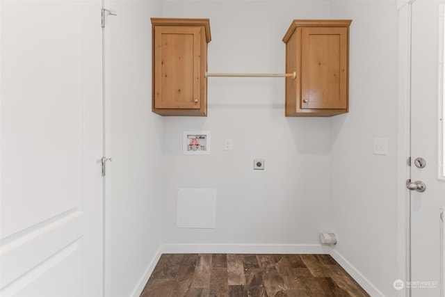 washroom featuring electric dryer hookup, dark hardwood / wood-style floors, and hookup for a washing machine