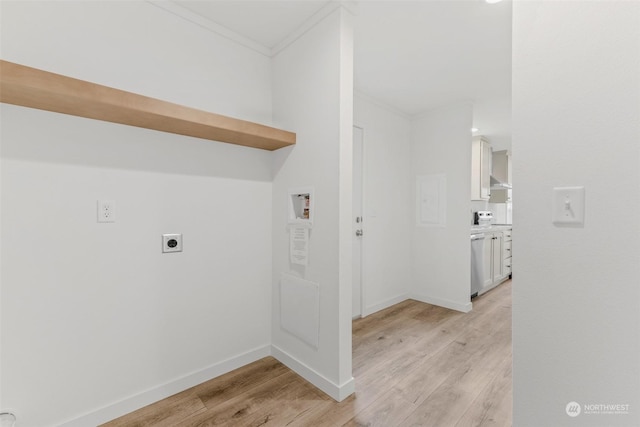 laundry area with hookup for an electric dryer, hookup for a washing machine, light hardwood / wood-style floors, and ornamental molding