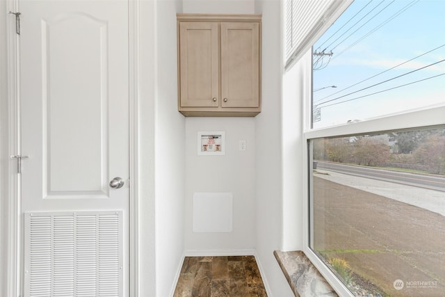 laundry room featuring cabinets and hookup for a washing machine