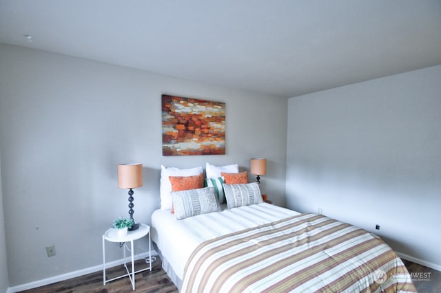 bedroom featuring dark hardwood / wood-style floors