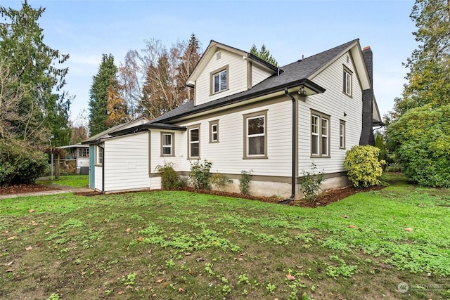 view of front of home with a front yard