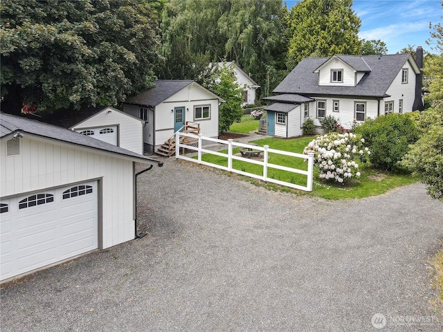 3608 Gay Rd E, Tacoma, WA 98443 - view of front of home featuring an outbuilding and a shingled roof