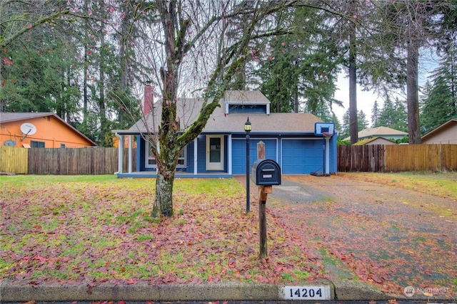 view of front of home featuring a garage