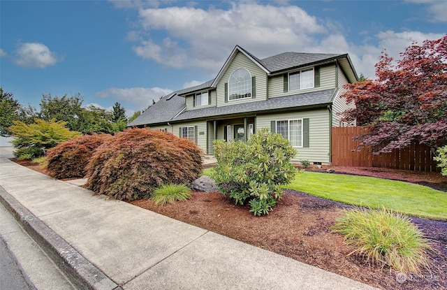 view of front of home featuring a front lawn