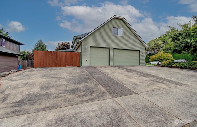 exterior space with a garage