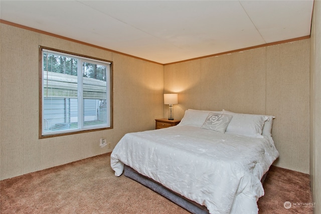 bedroom with carpet floors and ornamental molding