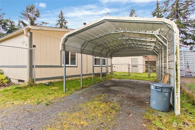 view of parking / parking lot with a carport