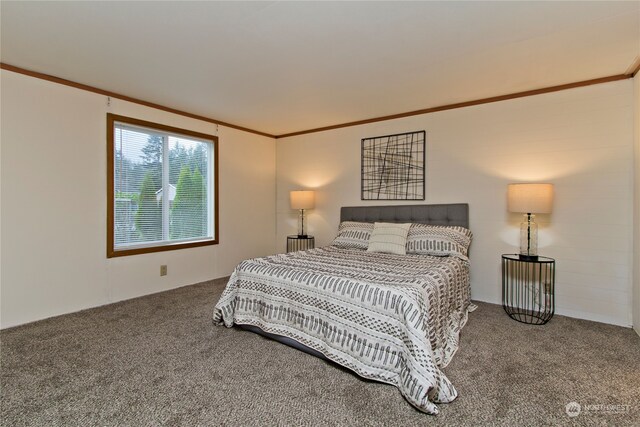 bedroom featuring carpet flooring and crown molding