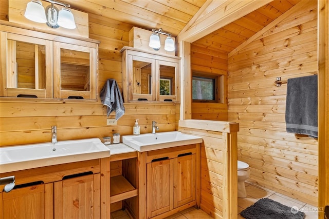 bathroom with wooden ceiling, tile patterned flooring, lofted ceiling, wooden walls, and vanity