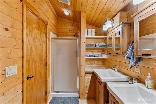 bathroom with wood walls, lofted ceiling, a shower with door, and wood ceiling