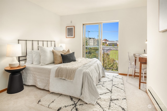 bedroom with access to exterior, light carpet, and a baseboard radiator