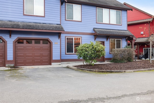 view of front of property featuring a garage