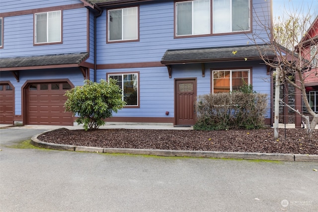 front of property featuring a garage