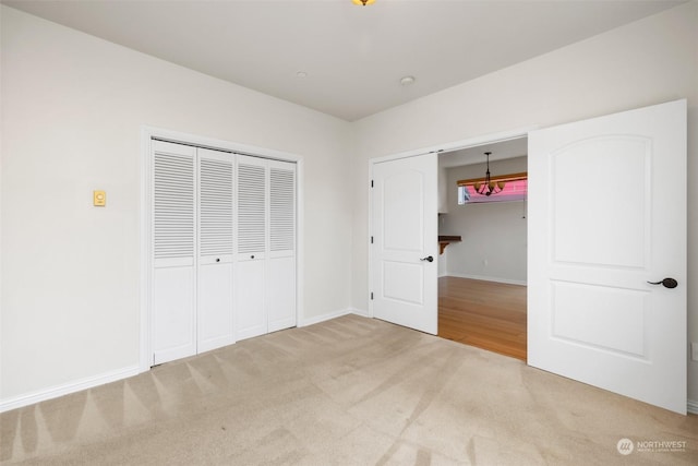 2606 Peach Ct Unit B, Port Angeles, WA 98363 - unfurnished bedroom featuring carpet floors, a closet, and baseboards