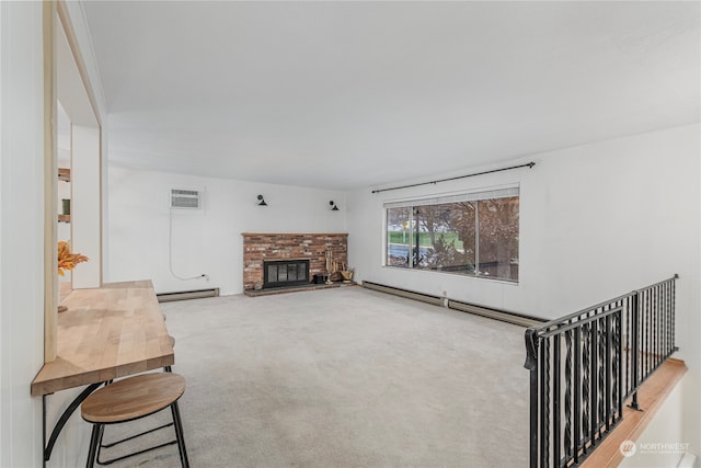 living room with carpet, a baseboard heating unit, a baseboard radiator, and a brick fireplace